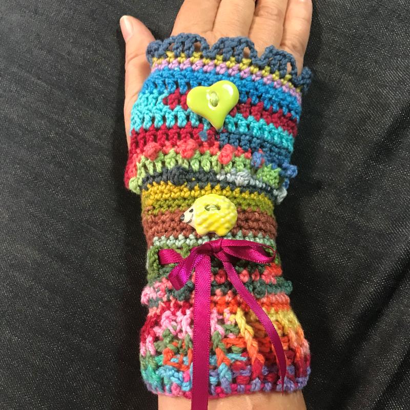 Crochet fiddle mitts aid for people living with autism or dementia