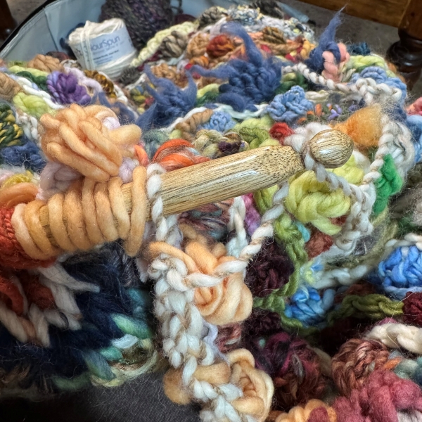 Tunisian crochet tools - hook with stitches on